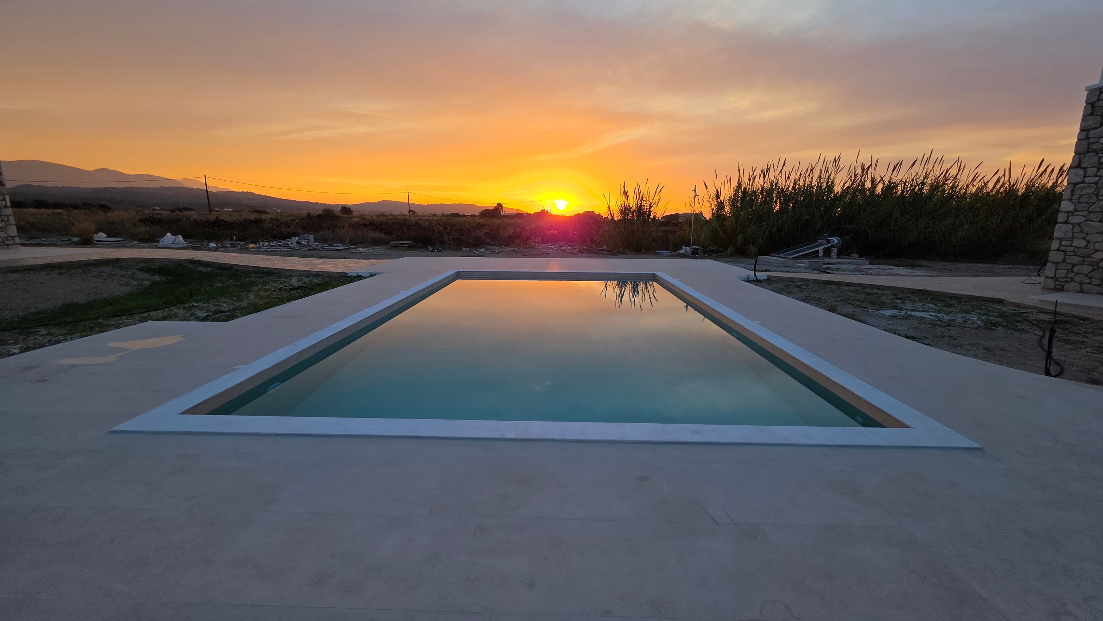Sunset over the pool