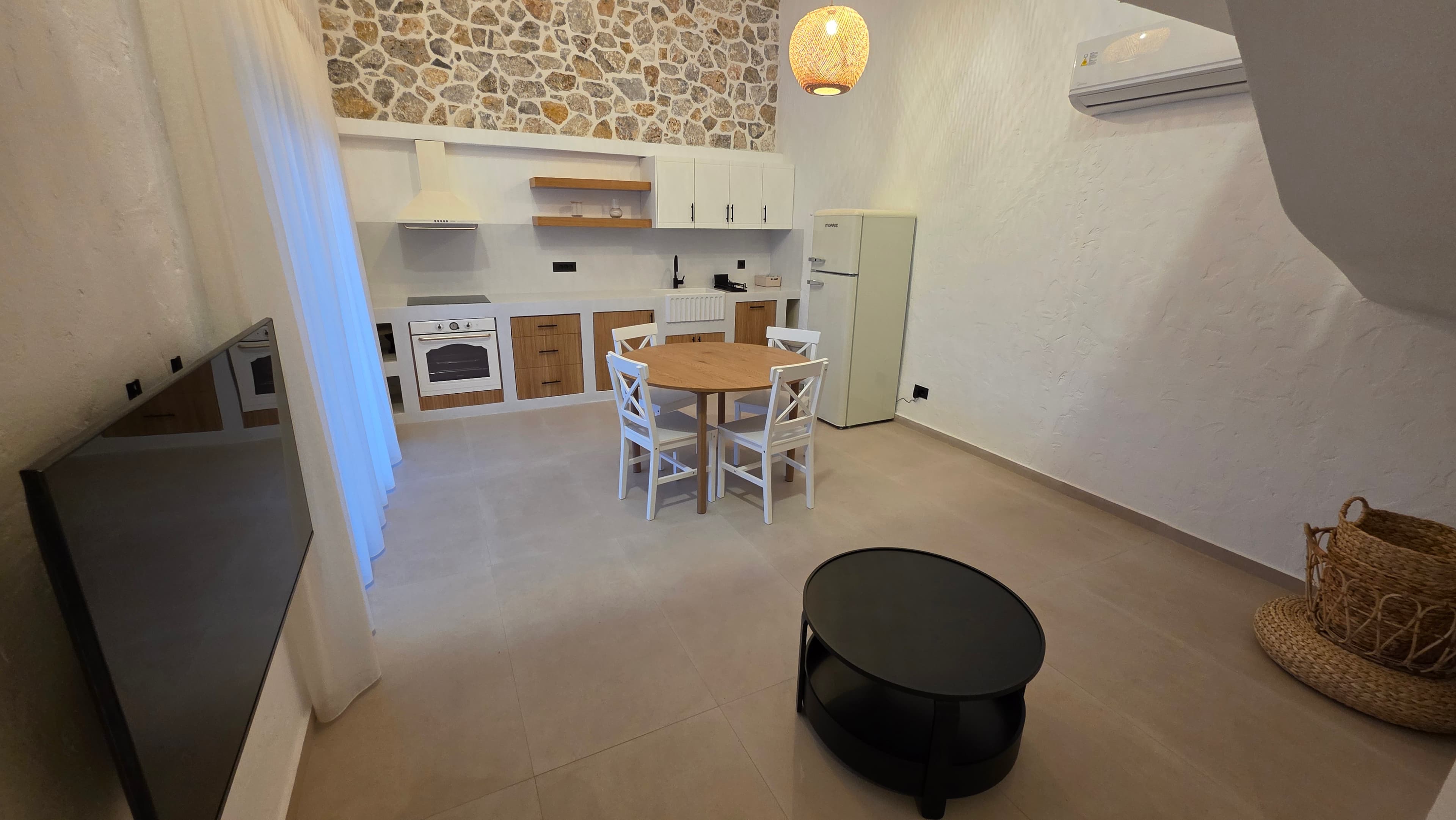 Kitchen with stone wall